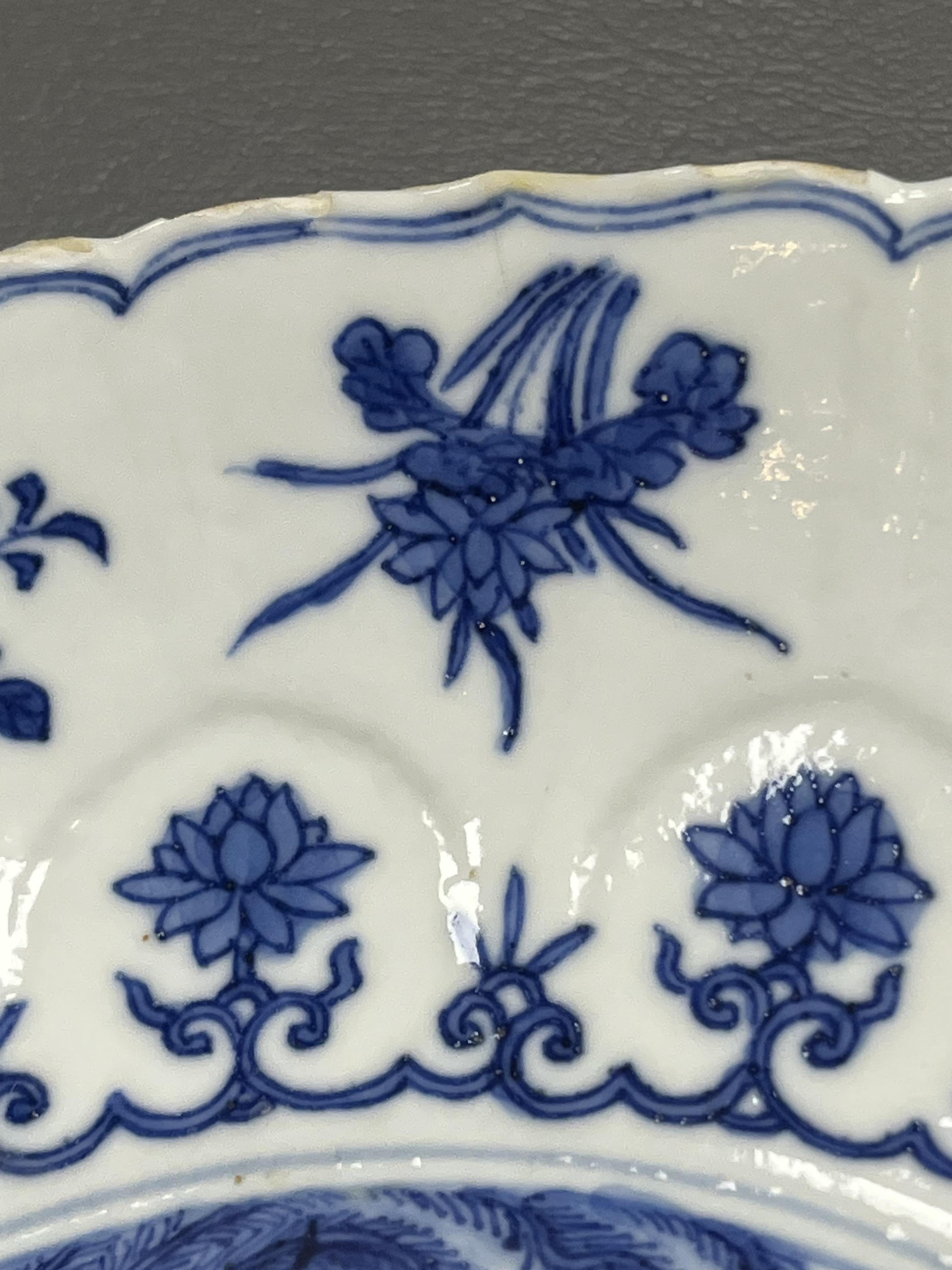 A Chinese blue and white ‘ladies and phoenix’ dish, Kangxi period